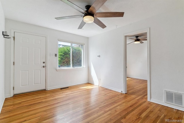 1804 Grove St, Denver, CO 80204 - entrance foyer with a ceiling fan, visible vents, and light wood-style floors