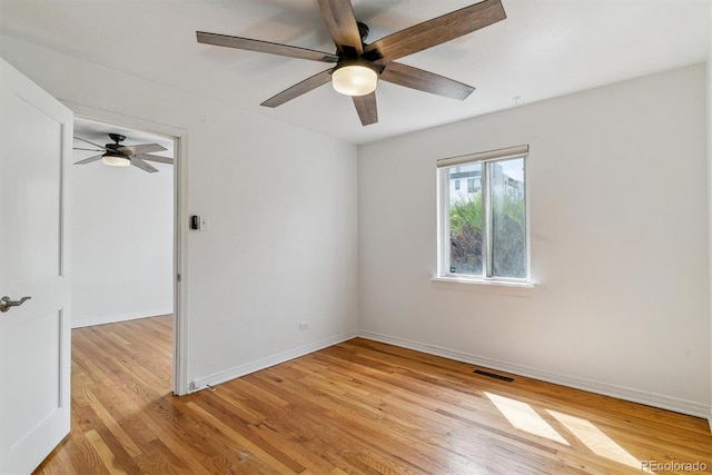 1804 Grove St, Denver, CO 80204 - spare room featuring ceiling fan, baseboards, visible vents, and light wood-type flooring