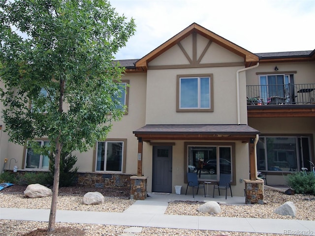 219 Summitview Ln, Poncha Springs, CO 81201 - view of front facade featuring stucco siding and covered porch