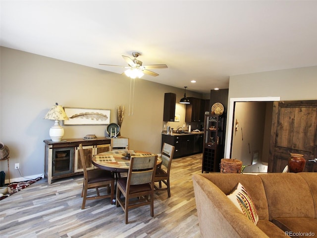 219 Summitview Ln, Poncha Springs, CO 81201 - dining room featuring a ceiling fan, light wood finished floors, and recessed lighting
