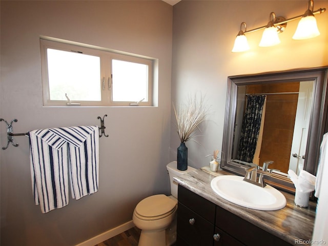 219 Summitview Ln, Poncha Springs, CO 81201 - full bathroom with vanity, a shower with shower curtain, and wood finished floors