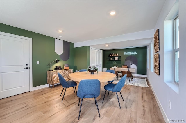 dining space featuring light hardwood / wood-style floors