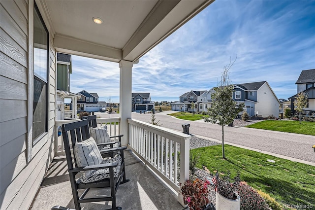 balcony featuring covered porch