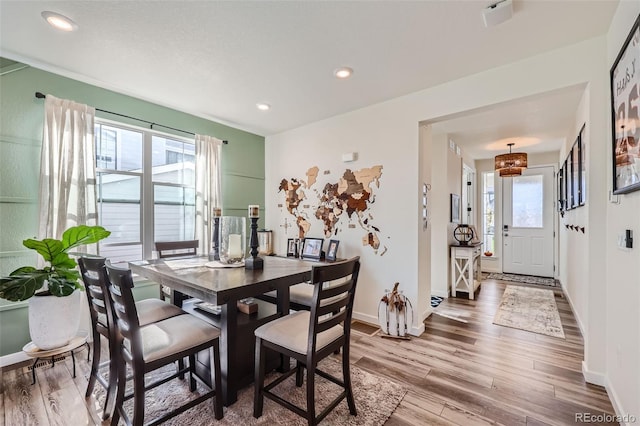 dining space featuring hardwood / wood-style floors