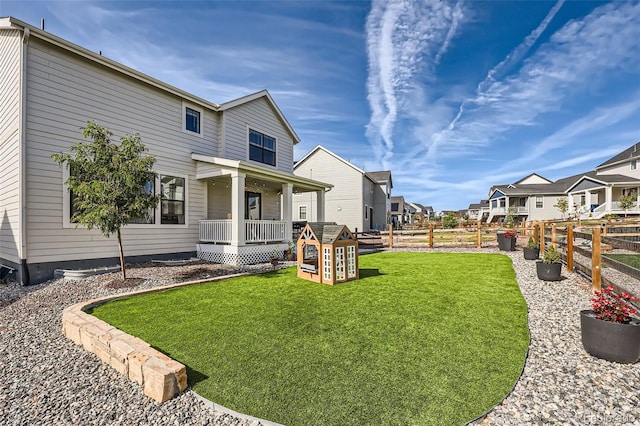 view of yard featuring a porch