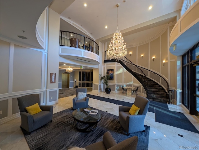 1827 N Grant St Unit 1104, Denver, CO 80203 - building lobby featuring high vaulted ceiling, recessed lighting, stairway, and a decorative wall