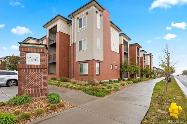 view of property with a residential view