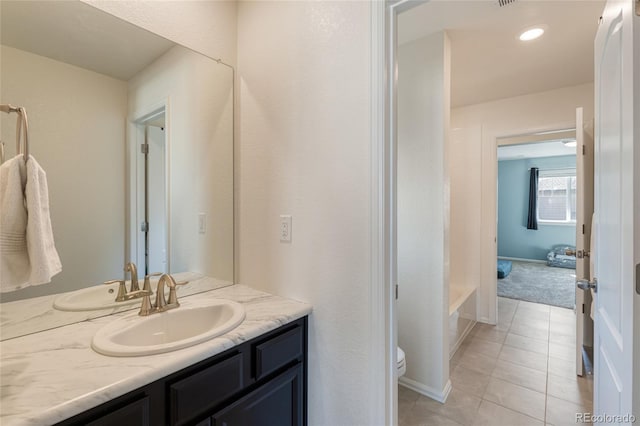 full bathroom featuring vanity, toilet, recessed lighting, and tile patterned flooring