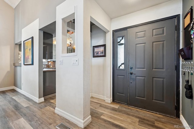 foyer featuring hardwood / wood-style floors