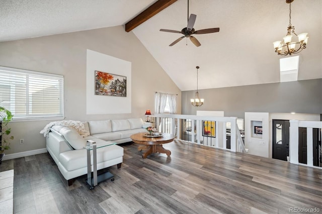 living room featuring beam ceiling, ceiling fan with notable chandelier, hardwood / wood-style flooring, and high vaulted ceiling