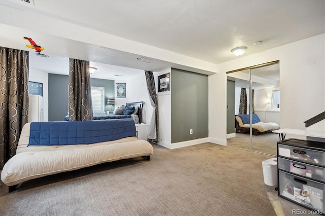 bedroom featuring a closet and carpet