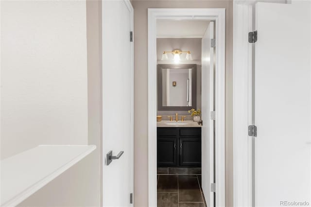 6858 Zenobia St Unit 9, Westminster, CO 80030 - bathroom featuring vanity and tile patterned floors