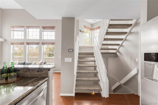 6858 Zenobia St Unit 9, Westminster, CO 80030 - stairway featuring wood finished floors and baseboards
