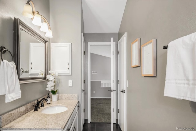 6858 Zenobia St Unit 9, Westminster, CO 80030 - bathroom with tile patterned floors and vanity