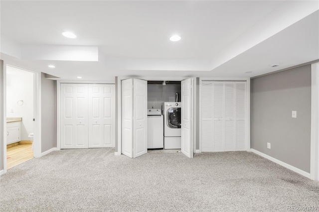 6858 Zenobia St Unit 9, Westminster, CO 80030 - unfurnished bedroom with independent washer and dryer, light carpet, baseboards, multiple closets, and recessed lighting