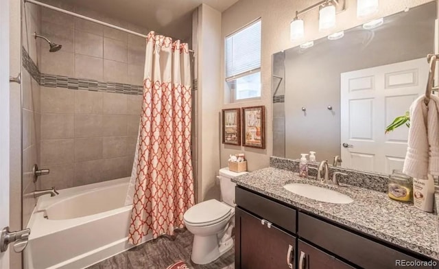 6765 Windbrook Ct, Colorado Springs, CO 80927 - full bathroom featuring vanity, shower / tub combo, and wood finished floors