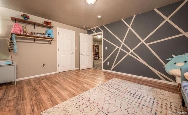 6765 Windbrook Ct, Colorado Springs, CO 80927 - unfurnished bedroom with wood finished floors