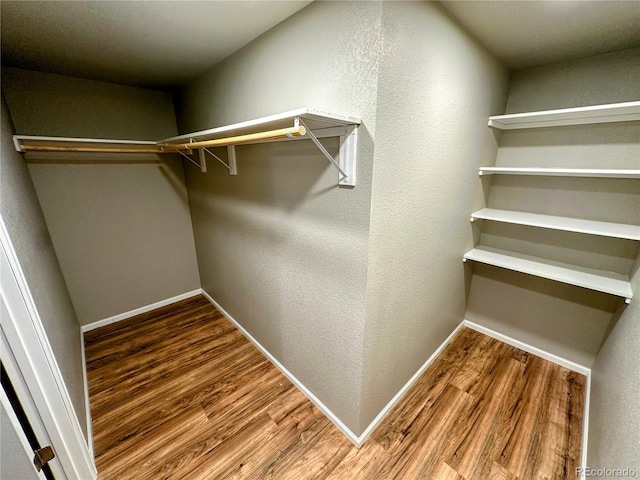 6765 Windbrook Ct, Colorado Springs, CO 80927 - spacious closet with wood finished floors