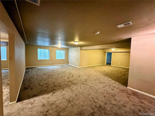 6765 Windbrook Ct, Colorado Springs, CO 80927 - unfurnished room featuring carpet floors, a textured ceiling, and a smoke detector