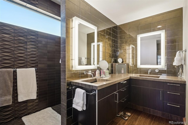 621 Kearney St, Denver, CO 80220 - bathroom with double vanity, tile walls, and a sink