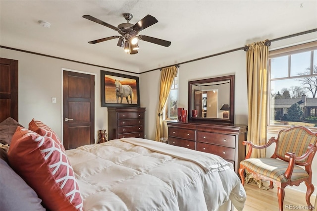 621 Kearney St, Denver, CO 80220 - bedroom with a ceiling fan and wood finished floors