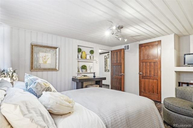 621 Kearney St, Denver, CO 80220 - bedroom with visible vents and wood finished floors