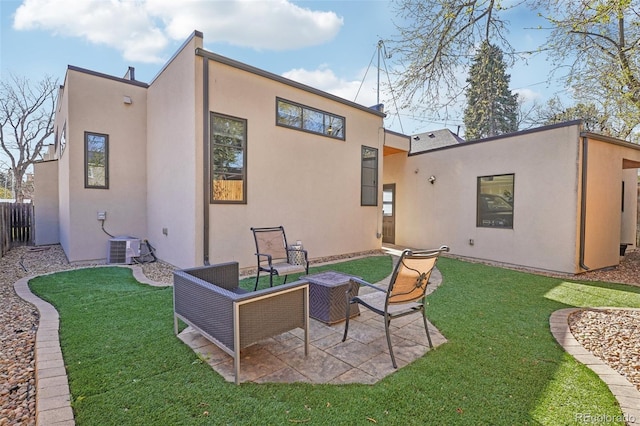 621 Kearney St, Denver, CO 80220 - back of house featuring a yard, a patio, fence, and stucco siding