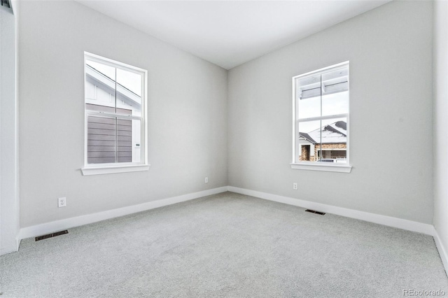 view of carpeted spare room