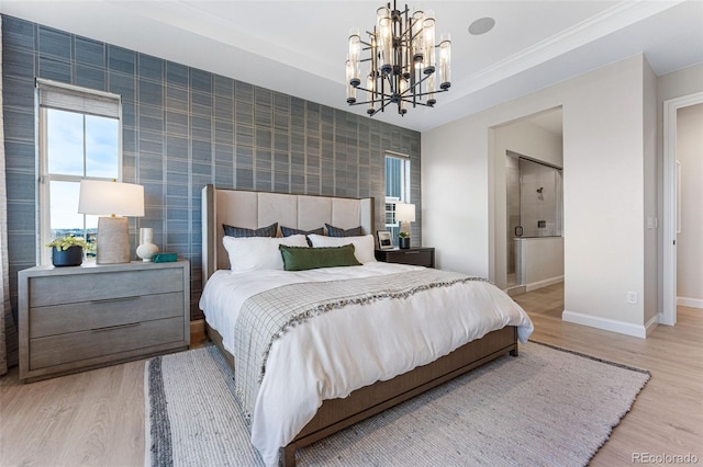 bedroom featuring hardwood / wood-style flooring, a notable chandelier, crown molding, and tile walls