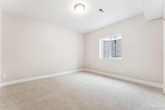 view of carpeted spare room