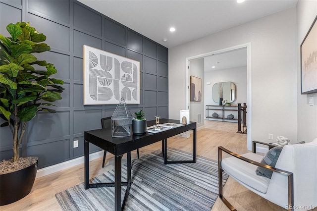 office space with light hardwood / wood-style floors