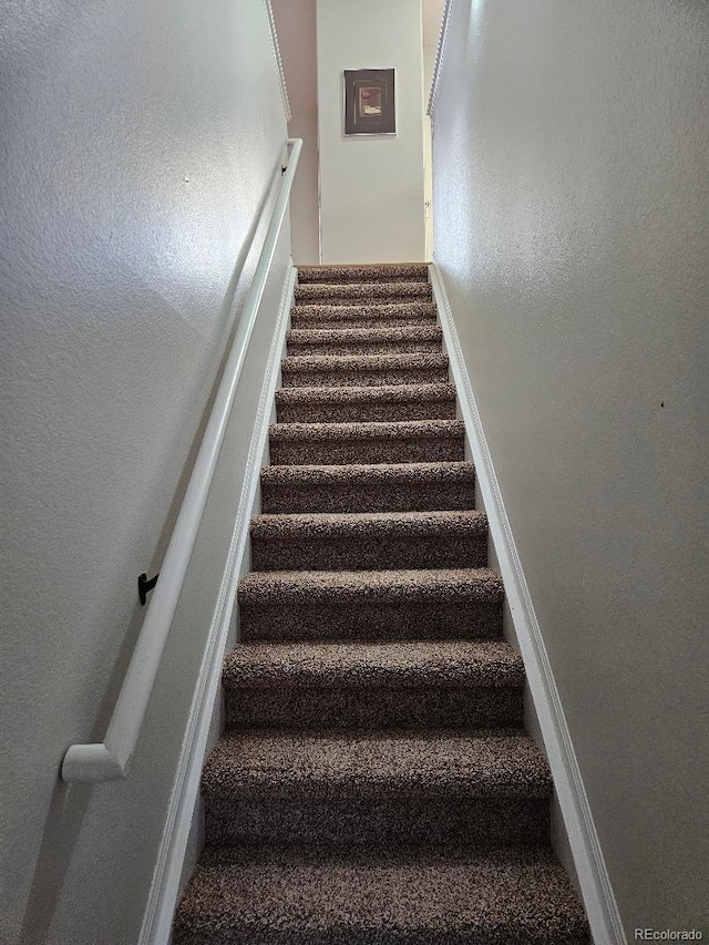808 Idalia St, Aurora, CO 80011 - stairs with baseboards