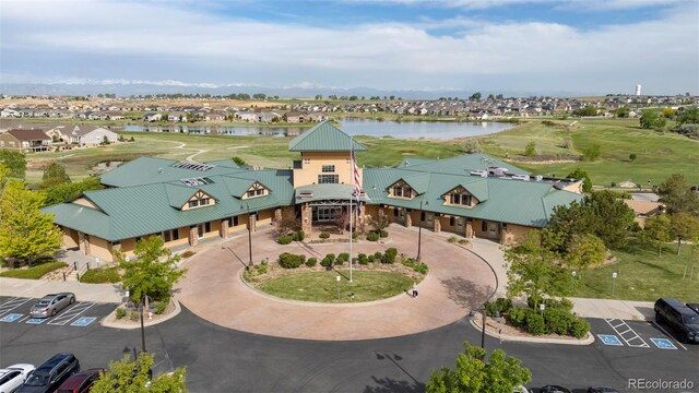 15604 Xenia Way, Brighton, CO 80602 - aerial perspective of suburban area with a large body of water and a golf club