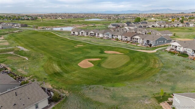 15604 Xenia Way, Brighton, CO 80602 - aerial perspective of suburban area featuring a water and mountain view and a golf club