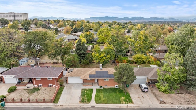 bird's eye view featuring a residential view and a mountain view