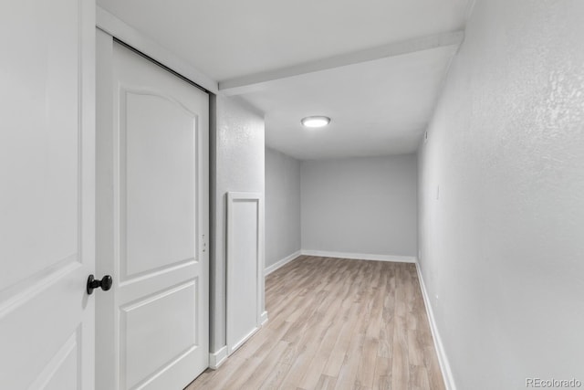 hallway with light wood-type flooring