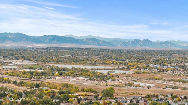 view of mountain feature with a water view