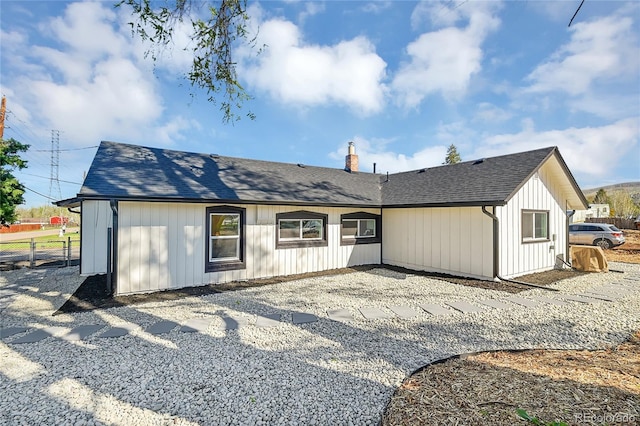 16130 Mt Vernon Rd, Golden, CO 80401 - rear view of property with fence and a shingled roof