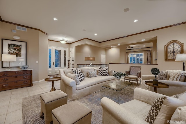 living room featuring french doors, light tile patterned floors, recessed lighting, visible vents, and baseboards