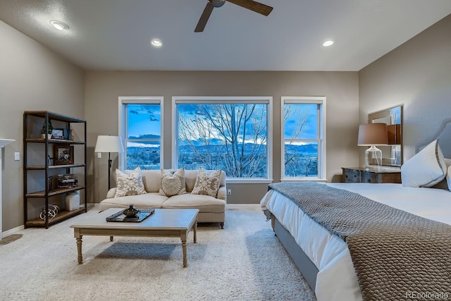 bedroom with recessed lighting, light carpet, ceiling fan, and baseboards