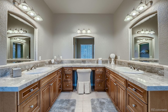 full bathroom featuring vanity and tile patterned floors