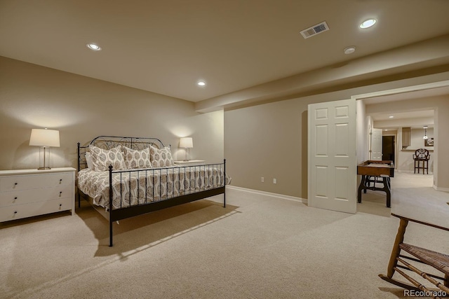 carpeted bedroom featuring baseboards, visible vents, and recessed lighting