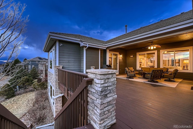 wooden deck featuring an outdoor hangout area