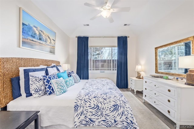 bedroom featuring ceiling fan and lofted ceiling