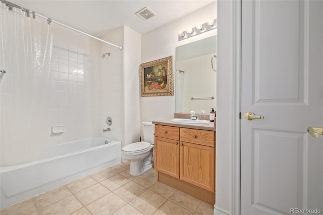 full bathroom with vanity, toilet, tile patterned floors, and shower / bath combo