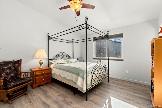 bedroom with hardwood / wood-style floors