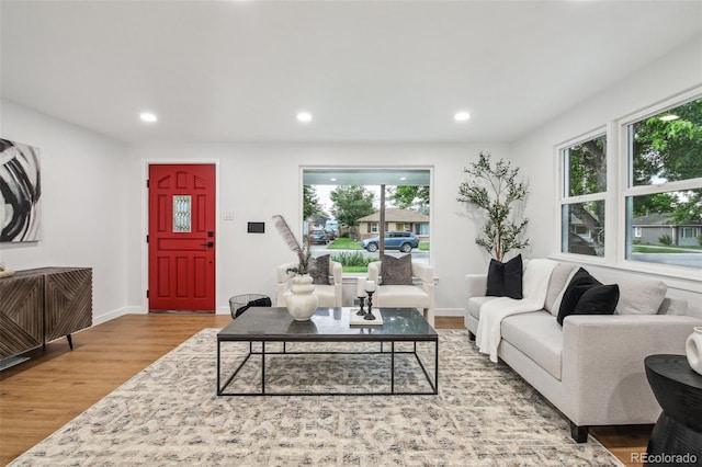 5515 Dudley Ct, Arvada, CO 80002 - living room featuring wood finished floors, recessed lighting, and baseboards