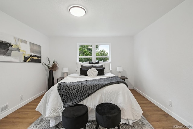 5515 Dudley Ct, Arvada, CO 80002 - bedroom featuring wood finished floors