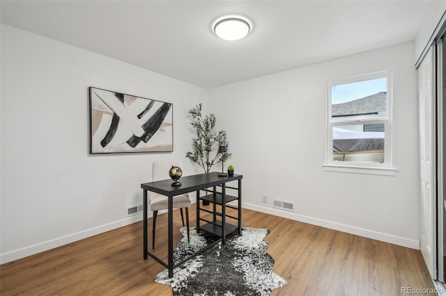 5515 Dudley Ct, Arvada, CO 80002 - office space with light wood-style floors and baseboards