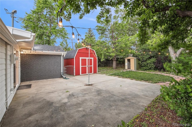 5515 Dudley Ct, Arvada, CO 80002 - view of patio with a storage unit
